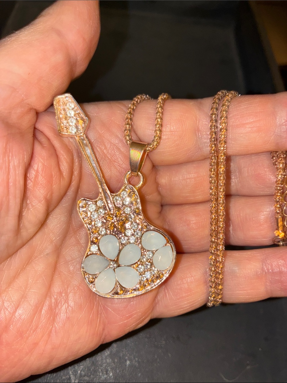Rose Gold Guitar Pendant Necklace with White Petal Accents